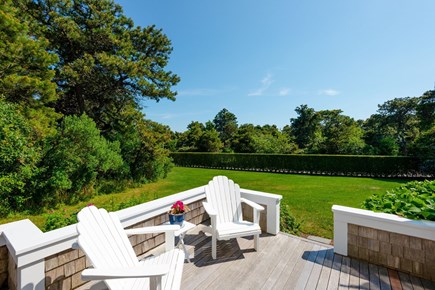 Mid-island Nantucket vacation rental - Take your morning coffee overlooking the oversized, private lawn.