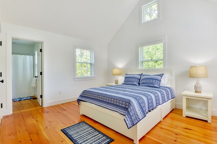 Mid-island Nantucket vacation rental - A light filled bedroom with a queen bed.