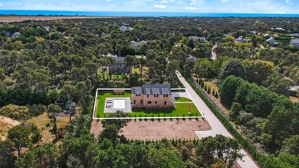 Mid-island Nantucket vacation rental - Aerial shot of the private property and long seashell driveway