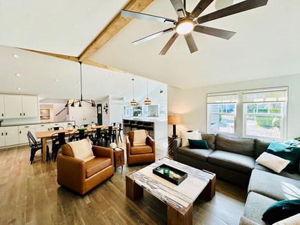 Mid-Island Nantucket vacation rental - Open floorplan showing living room, dining and kitchen.