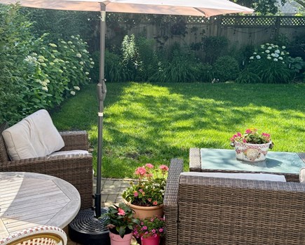 Mid-island Nantucket vacation rental - The settee provides ample lounging in the sun and in the shade