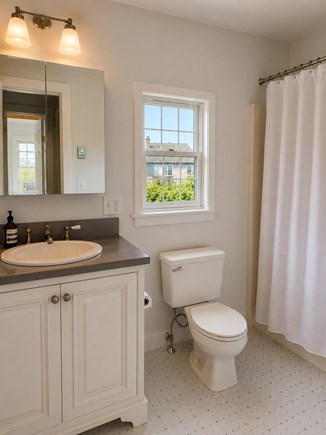 Madaket Nantucket vacation rental - Upstairs bathroom with bathtub/shower and closet extra storage.