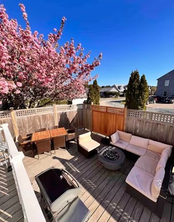 Nantucket town, Nantucket Nantucket vacation rental - Fenced-in yard with a fire pit, outdoor sectional, and grill