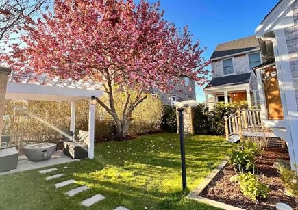 Nantucket town, Nantucket Nantucket vacation rental - Fenced-in yard with a fire pit, outdoor sectional, and grill