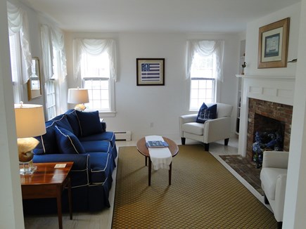 Mid-island, Naushop Nantucket vacation rental - Living room with fireplace and seating